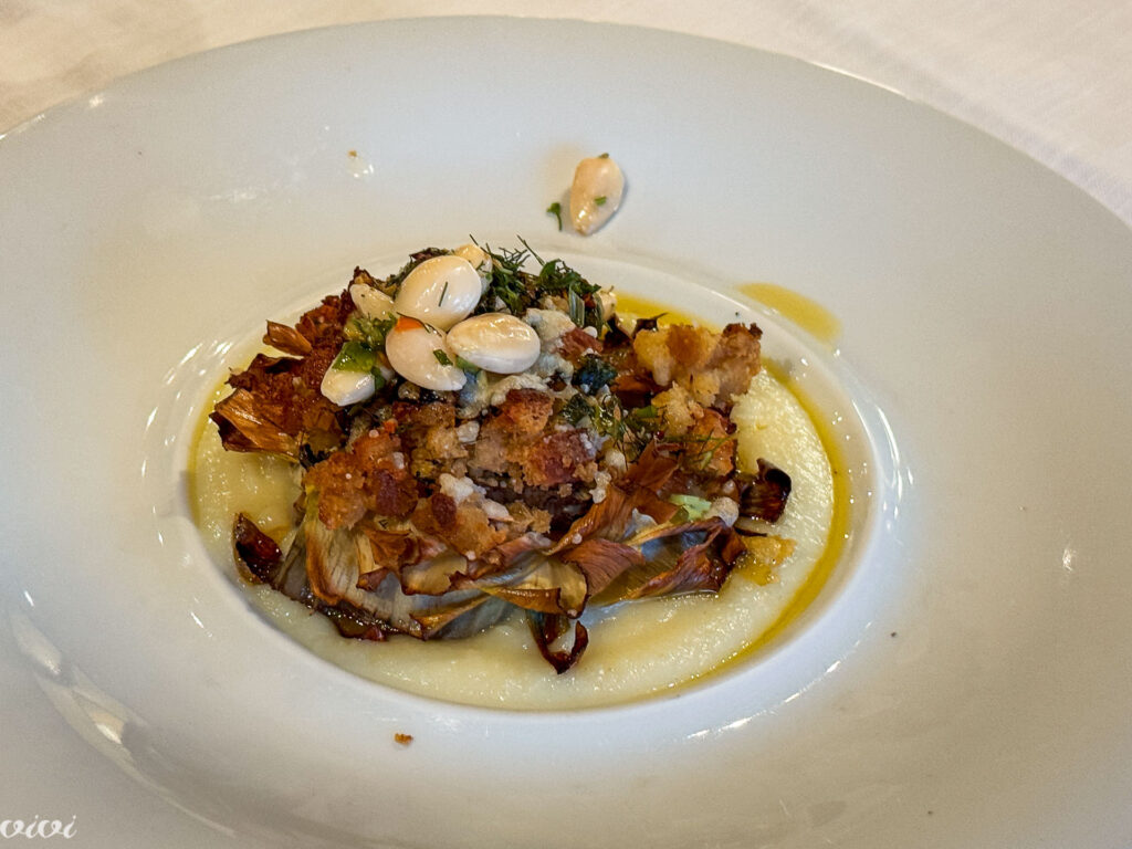 Bio Agriturismo Il Cerreto, gratinirana artičoka, krompirjeva krema, kruh, limona in mandlji